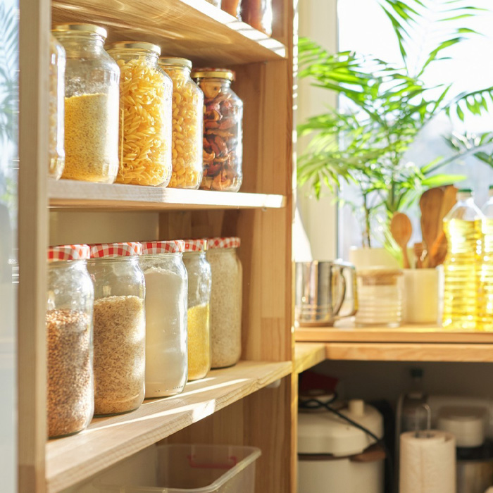 Jars with cereals on the shelves 