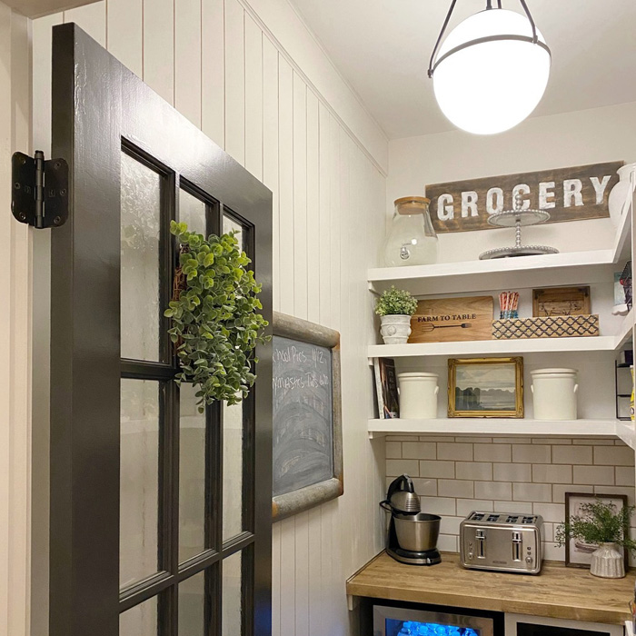 Storage with shelves and jars on it Storage with shelves and jars on it
