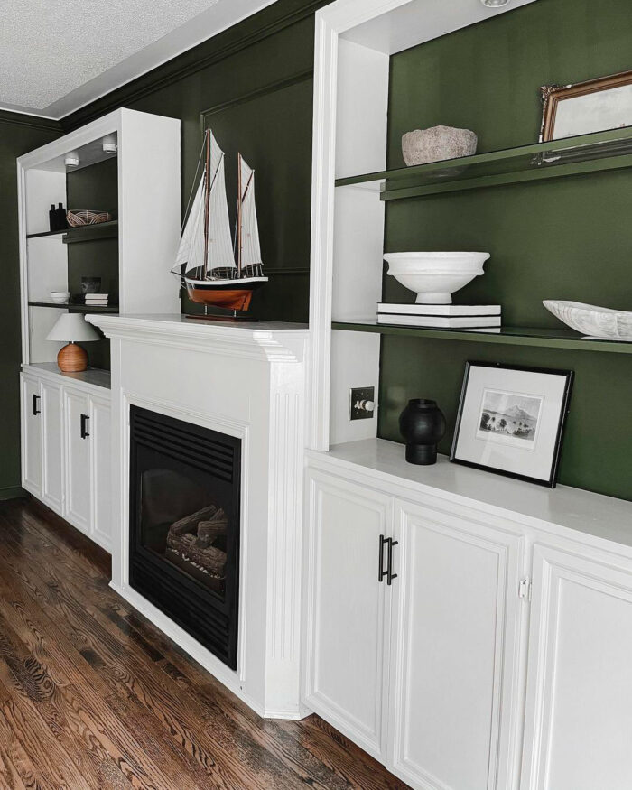 Shelves near fireplace painted with Sherwin-Williams paint colors in popular 2024 green option alternative to gray Shelves near fireplace painted with Sherwin-Williams paint colors in popular 2024 green option alternative to gray