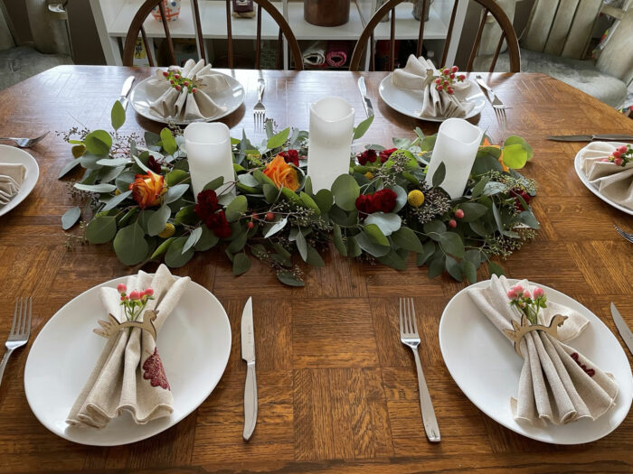 Floral table runner with candles