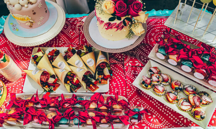 Candies and cakes on table