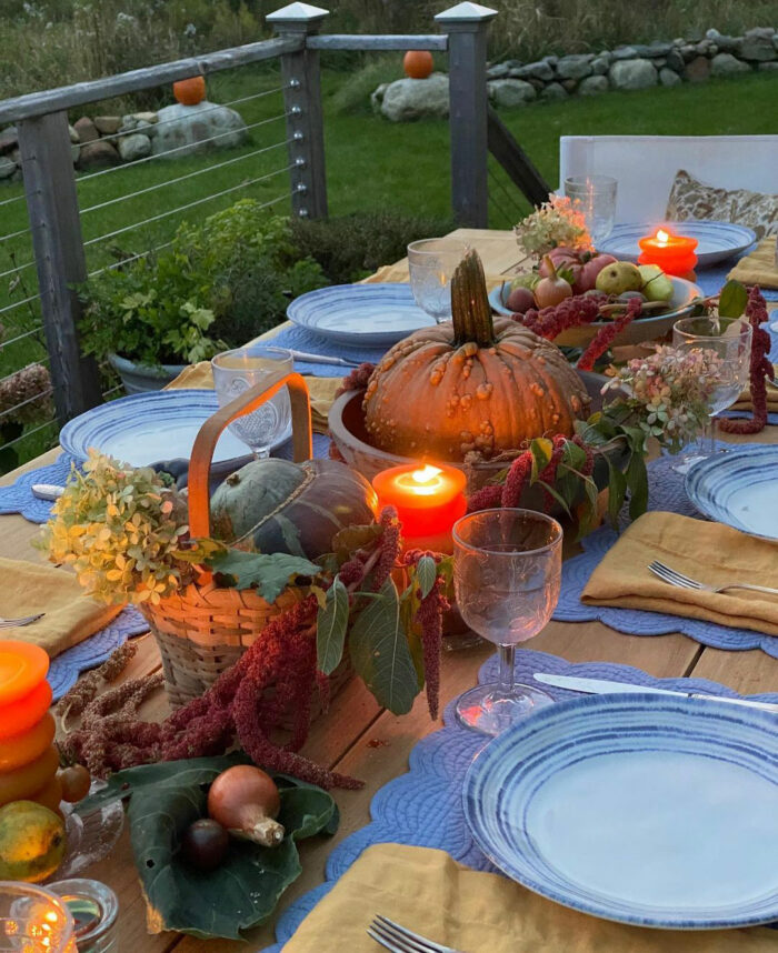 Baskets with pumpkins and other vegetable as a runner table