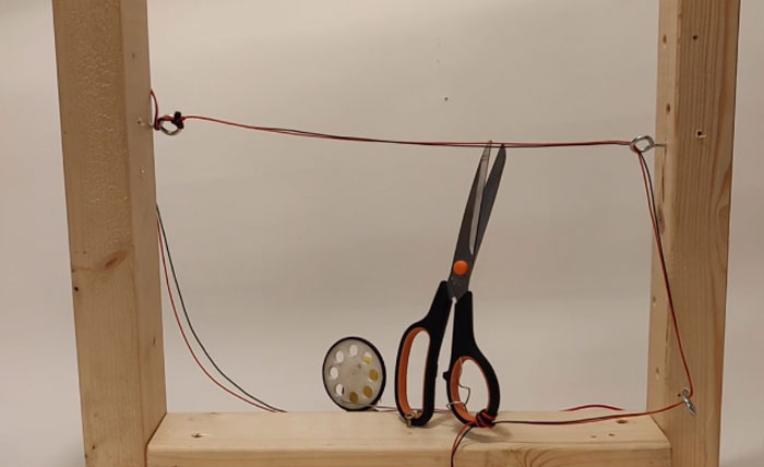 First Prototype Of My Newest Robot. The Cable It Is Trying To Cut Is The Cable Providing The System's Power