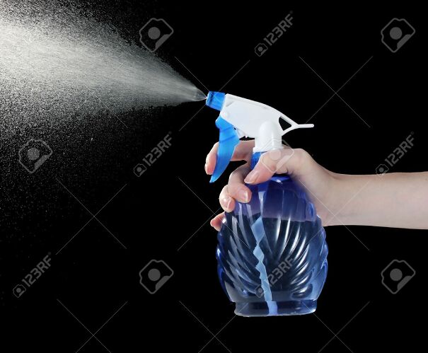 13901593-hand-holding-spray-bottle-and-spraying-on-black-background-654781c72930b.jpg