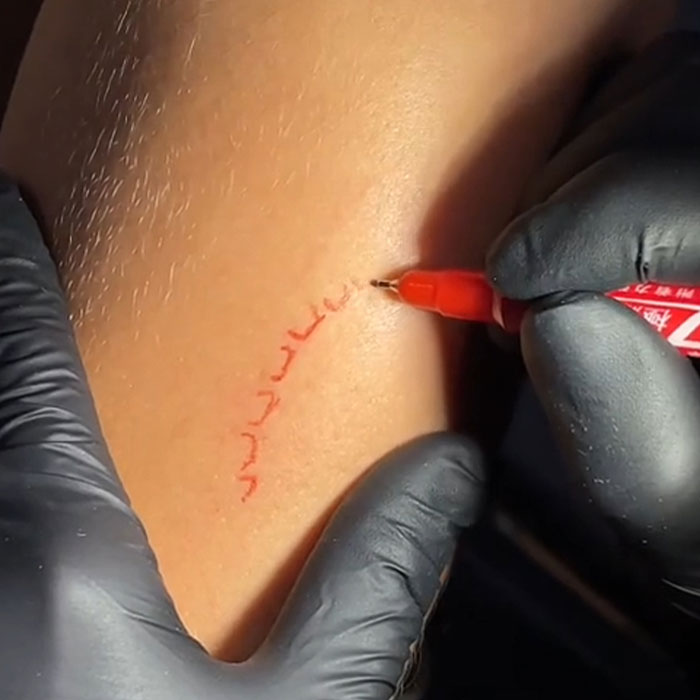 People Are Scared Man Will Get “One Hella Infection” After Tattooing His Girlfriend’s Bite Mark