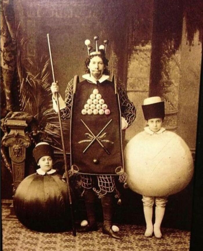 Celebrating Halloween In 1886: A Man Adorns Himself As The Billiards King While His Two Sons Attire As The 8 Ball And Cue Ball