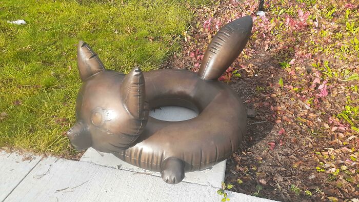 There Is A Bronze Statue Of A Pool Floatie At My Local Pool