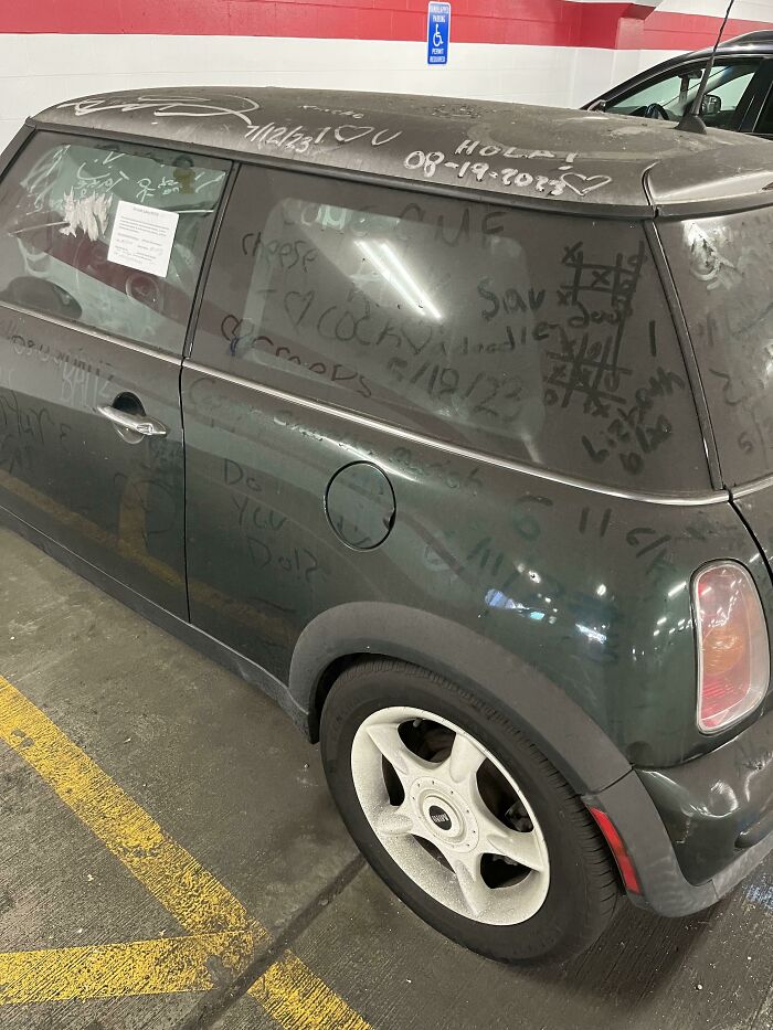 Abandoned Car Turned Art Piece In Hospital Parking Garage