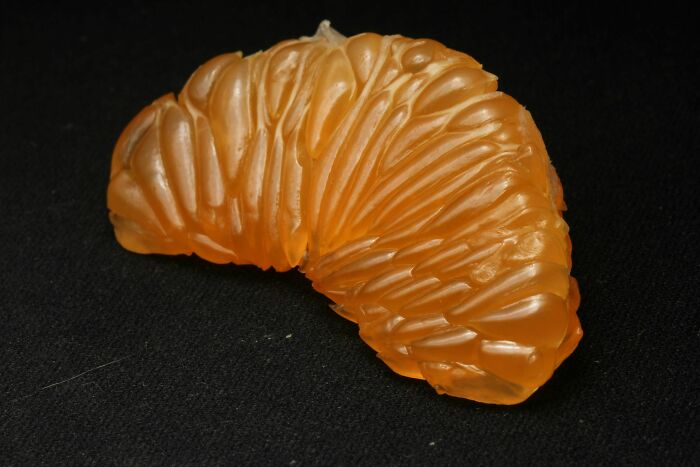 Close-Up Of A Peeled Clementine Wedge. It Fascinates Me A Bit Too Much