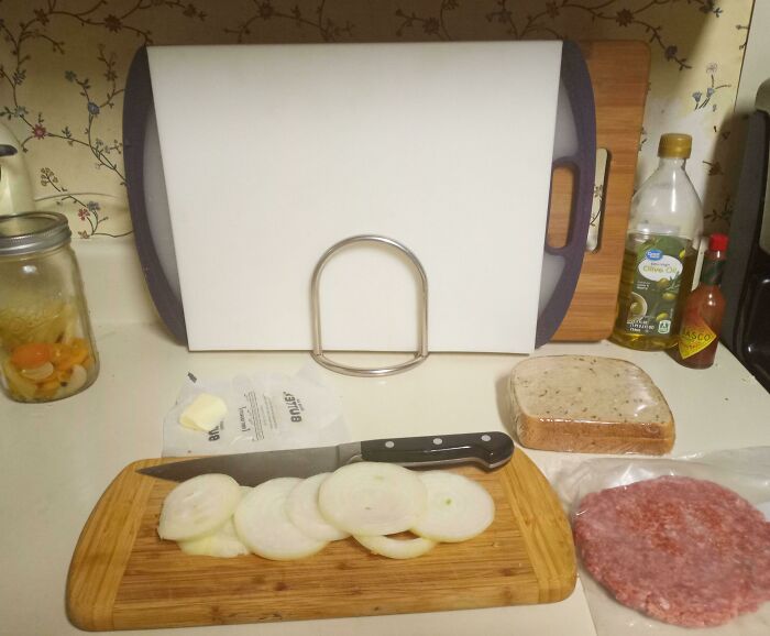 Use A Sturdy (Non-Rusting) Napkin Holder To Hold Your Cutting Boards Flush Up Against The Back Wall Of Your Main Prep Counter