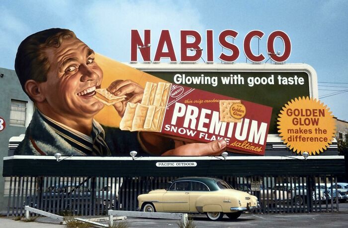 A Nabisco Saltine Billboard With A Happy, Smiling Man, Eating Saltines From A Red Premium Box, 1950s, Los Angeles, California