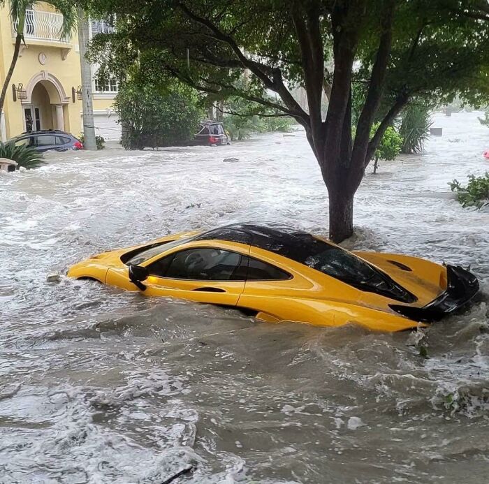 A Mclaren Underwater Due To Hurricane Ian In Miami