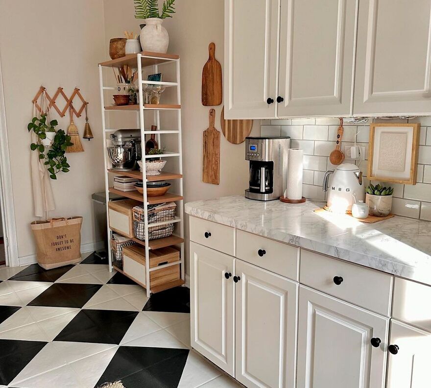 Black and white floor in white kitchen