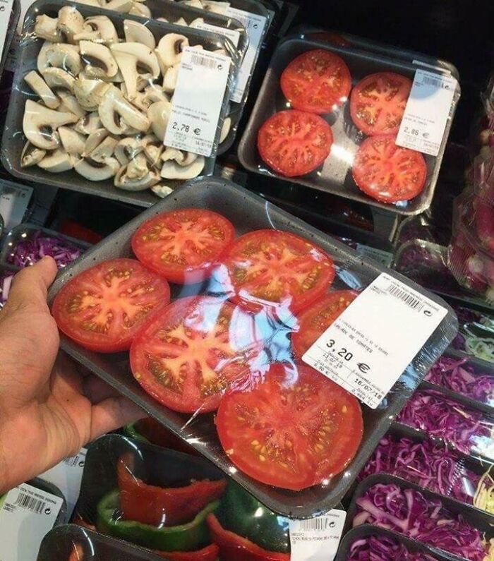 If Only Nature Would Find A Way To Cover These Tomatoes So We Wouldn't Waste So Much Plastic On Them