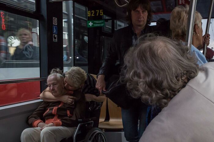 A Photograph Of People On The Bus