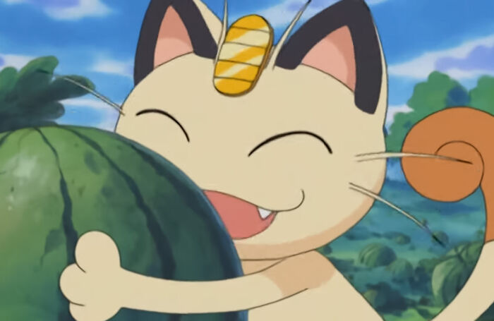 Meowth is happy holding a watermelon