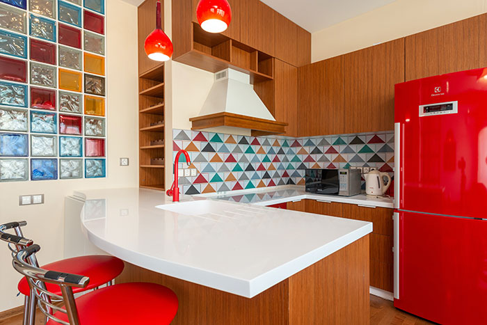 Photo of kitchen with colored interior. Photo of kitchen with colored interior.