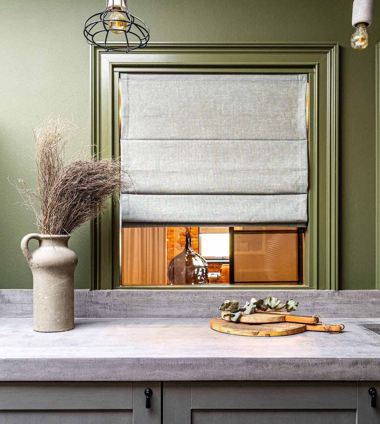 Kitchen with window and rough concrete rustic countertop