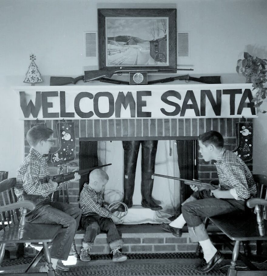 About To Shoot Santa (Or A Fisherman In Waders). And What Is That Small Kid Going To Do With The Rope? 1955