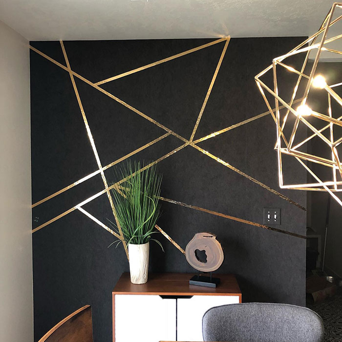 Accent wall design with gold parts