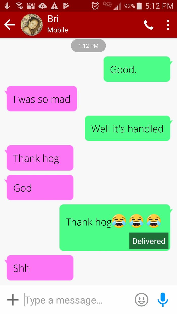 Text message conversation showing autocorrect errors with words like Thank hog instead of thank god in a messaging app.