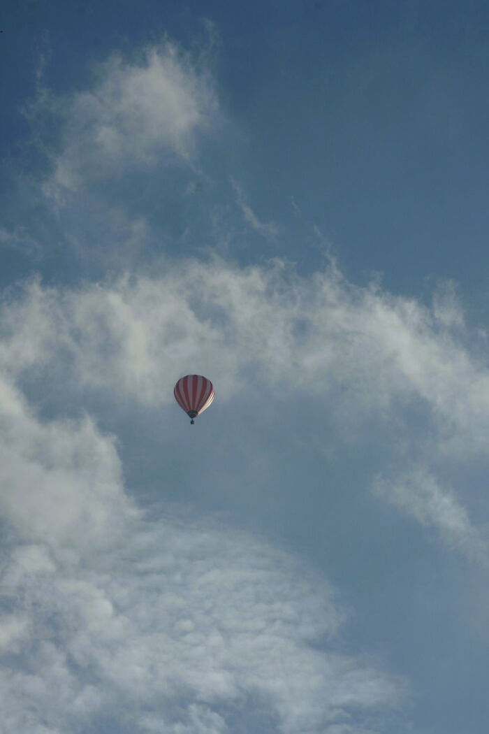 Blue Sky With Clouds And A Balloon