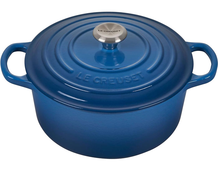 Le Creuset Enameled Cast Iron Signature Round Dutch Oven: Offers you shock-resistant enamel exterior, a non-stick and caramelization-friendly interior, and oven-safe stainless steel knob for high-temperature cooking.