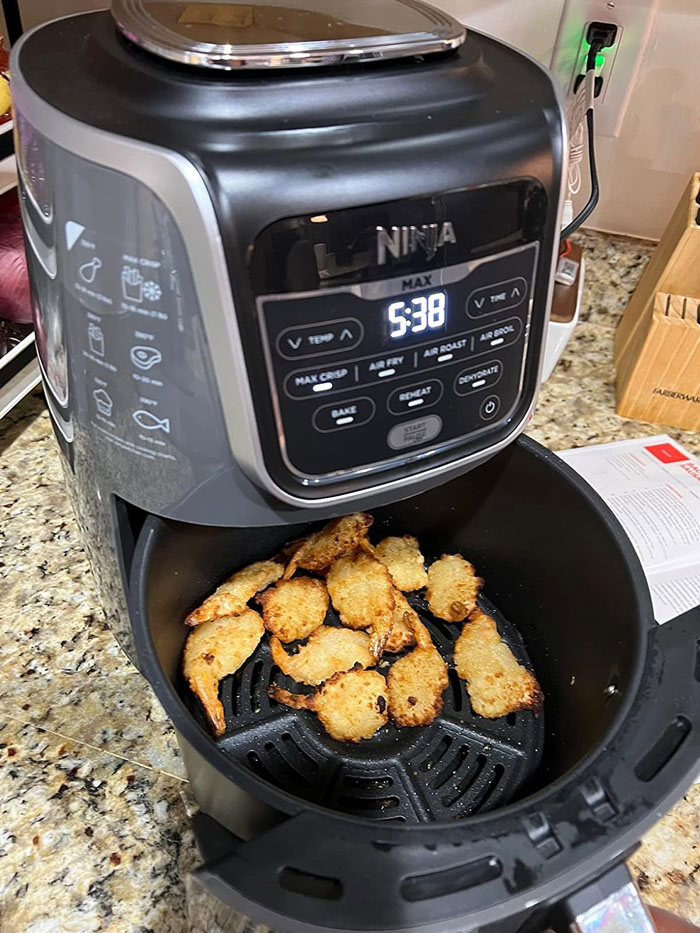 Ninja Af161 Max Xl Air Fryer: Enjoy healthier, guilt-free fried favorites with up to 75% less fat using this high-capacity air fryer, featuring advanced Max Crisp technology and a versatile 7-in-1 functionality, along with an easy-to-clean ceramic basket and an included chef-inspired recipe book.
