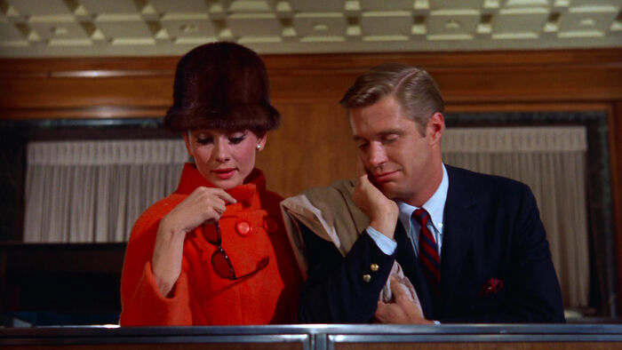 Audrey Hepburn and George Peppard looking at ring from Breakfast at Tiffany's