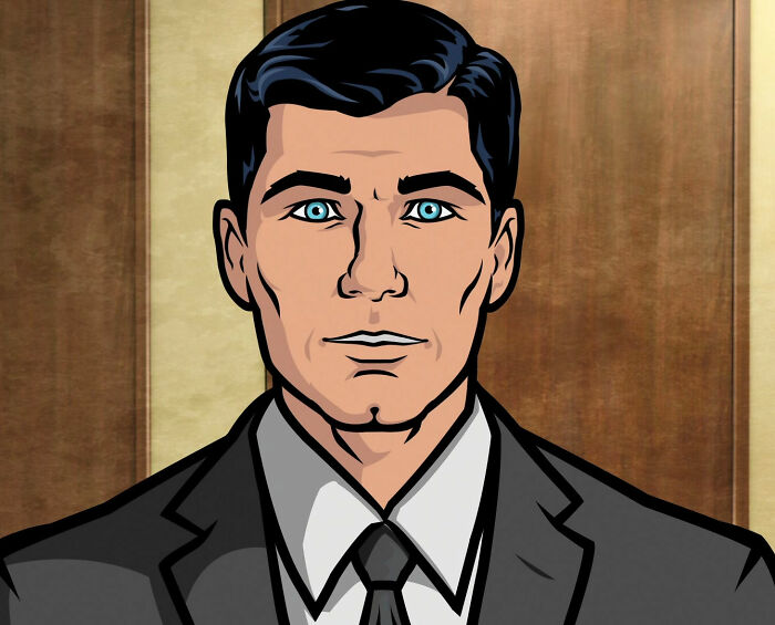 Sterling Archer looking and smiling from Archer