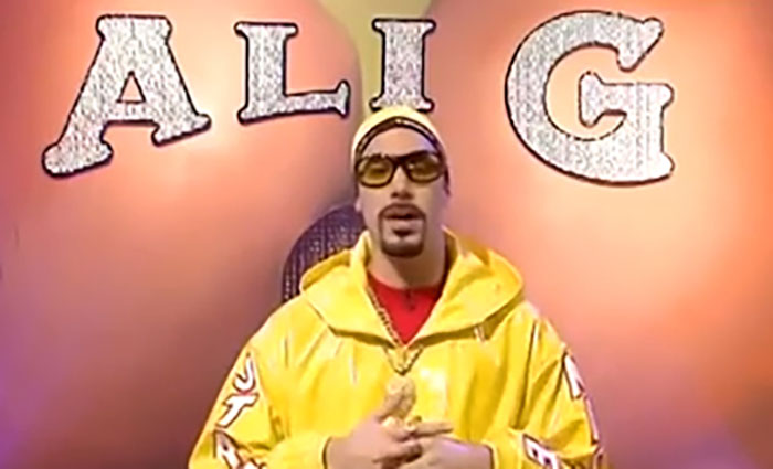 Ali G talking and wearing yellow hoodie from Da Ali G Show