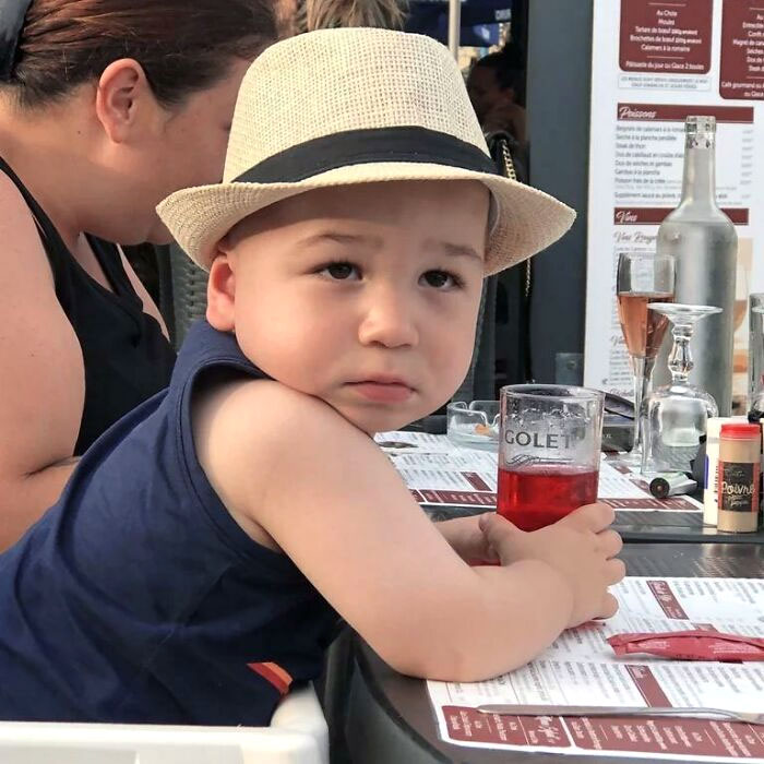 Old Baby Drinking A Negroni