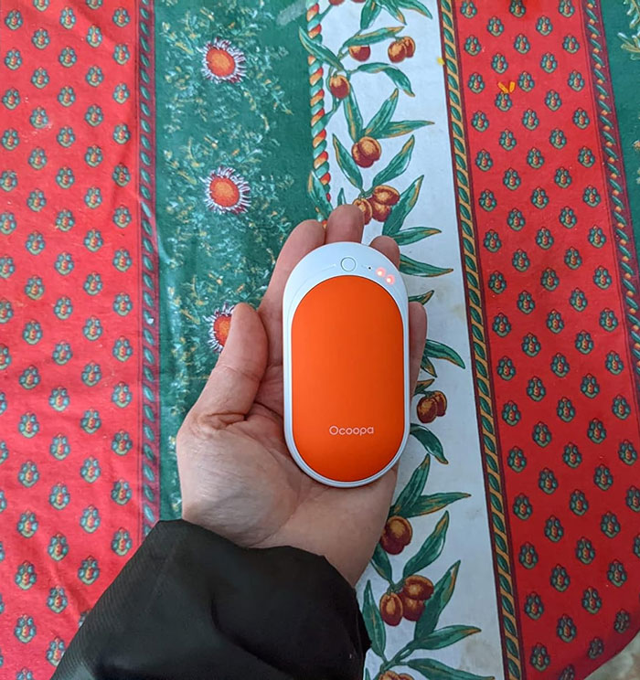 Ocoopa Hand Warmers Rechargeable: The perfect winter gift that doubles as a power bank and offers instant warmth with adjustable levels, keeping them warm and their gadgets powered all day long!