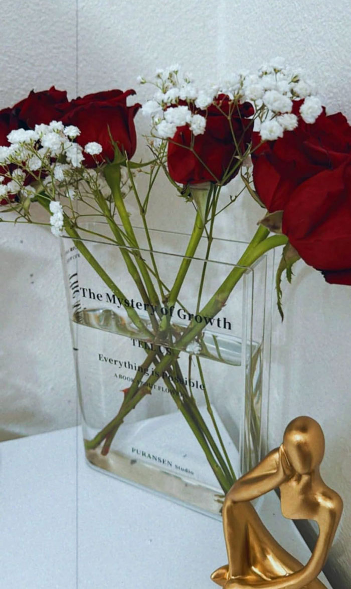 Book Vase For Flowers: Perfect for adding a unique literary charm to any space - for those who appreciate innovative home decor or seeking a surprising gift with a clever twist.