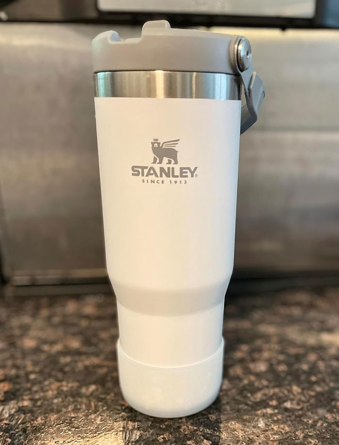 Stanley Iceflow Stainless Steel Tumbler With Straw: The perfect gift for friends who are always on-the-go, keeping beverages chilled for an entire day, it's an eco-friendly and stylish choice they'll definitely appreciate.