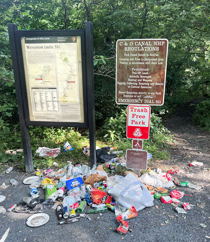 People Leaving Their Trash At The Trailhead Where The Sign Lets Them Know In Advance There Are No Trash Cans