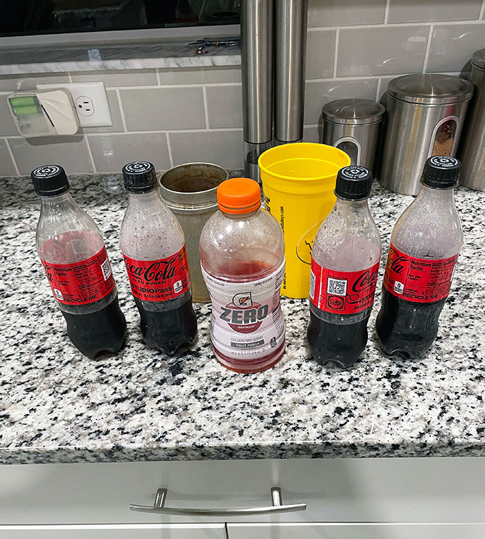 My Significant Other's Collection Of Unfinished Drinks In The Fridge