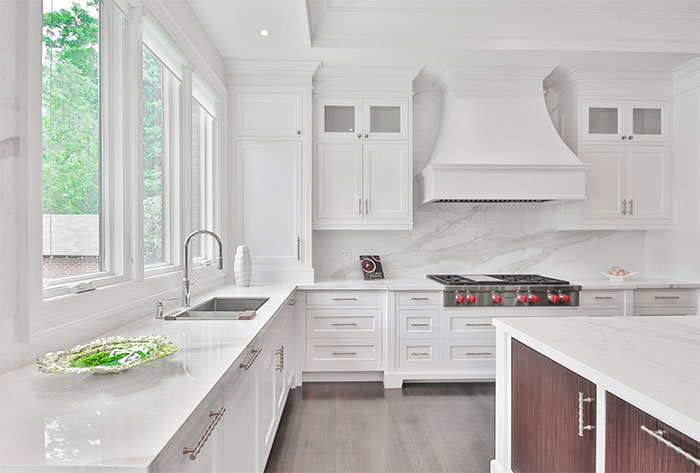 White kitchen with white marble countertops White kitchen with white marble countertops