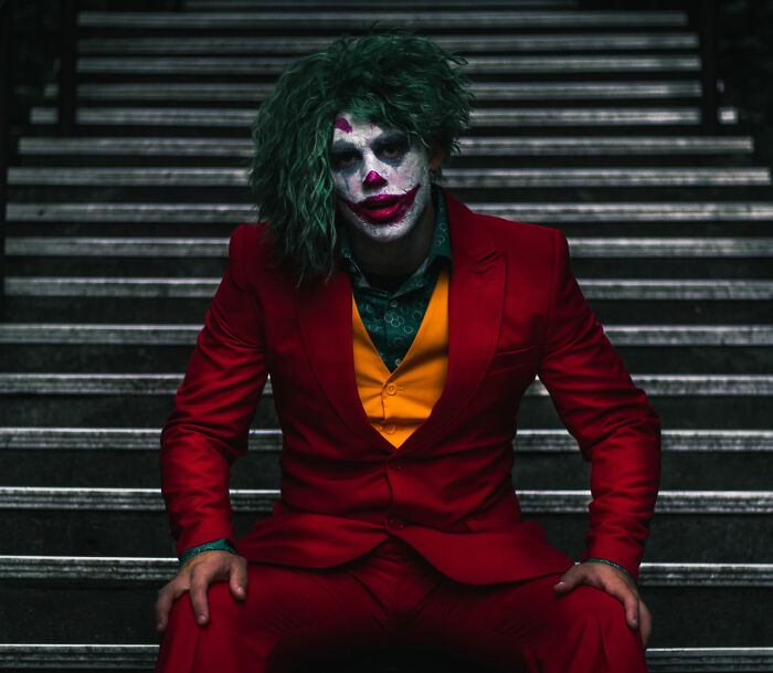 Man wearing Joker costume