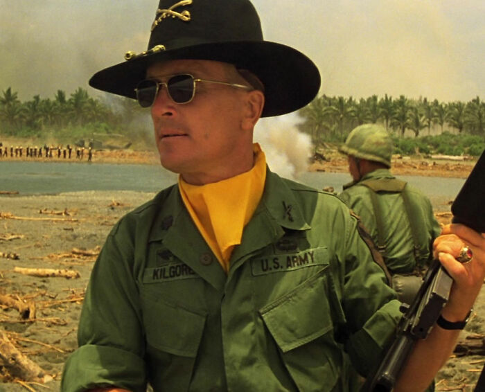 Robert Duvall walking and looking in Apocalypse Now