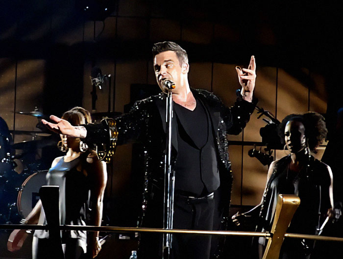 Robbie Williams Claims Rockstar Lifestyle From The 1990s Has Led To “Manopause” Robbie Williams Claims Rockstar Lifestyle From The 1990s Has Led To “Manopause”