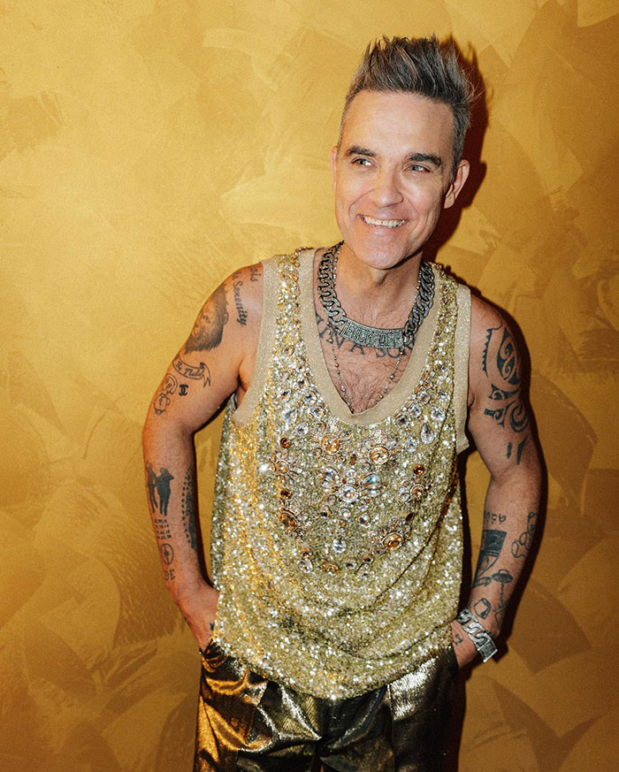 Robbie Williams Claims Rockstar Lifestyle From The 1990s Has Led To “Manopause”