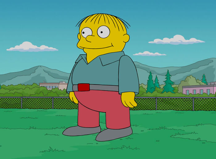 Ralph standing and looking from Simpsons