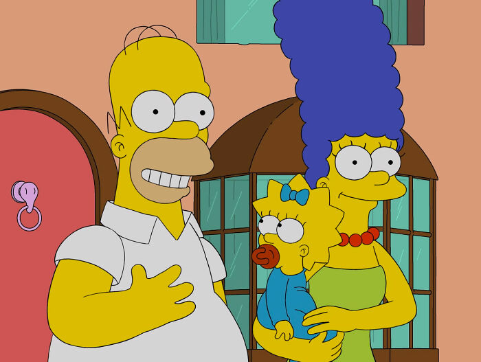 Homer Maggie and Marge looking and smiling