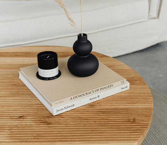 Candle on a book on the table Candle on a book on the table