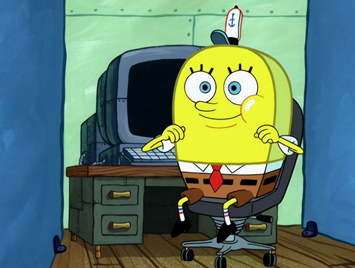 SpongeBob sitting on the computer 