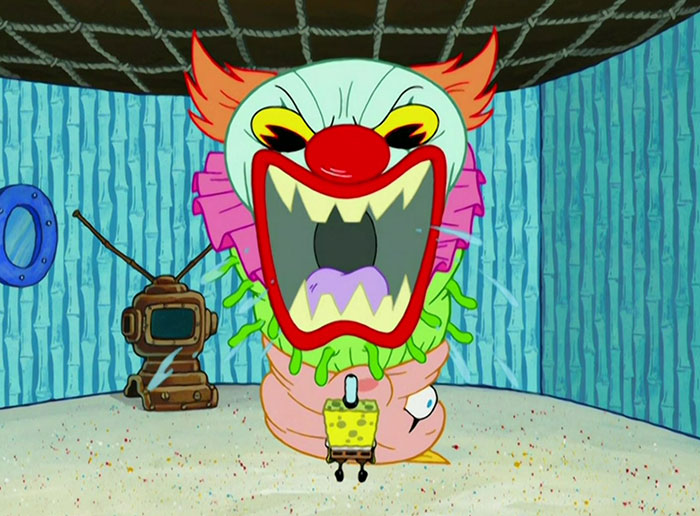 SpongeBob standing in front of a clown 