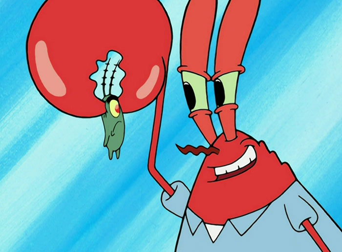 Mr. Krabs holding Plankton in his hands 