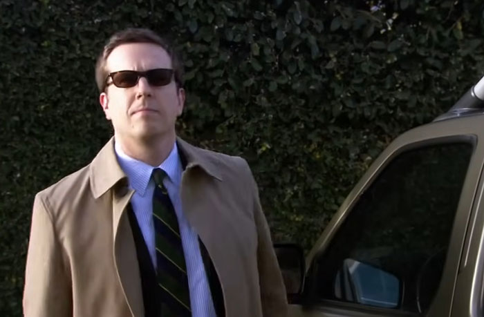 Andy Bernard getting out of the car with sunglasses on 