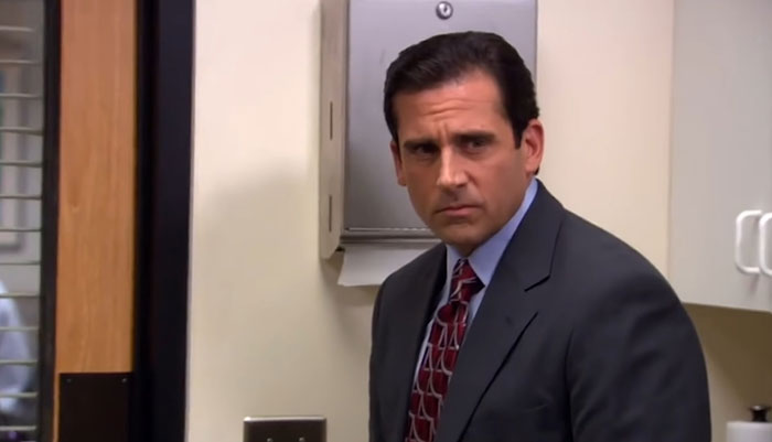 Michael Scott looking grumpy 